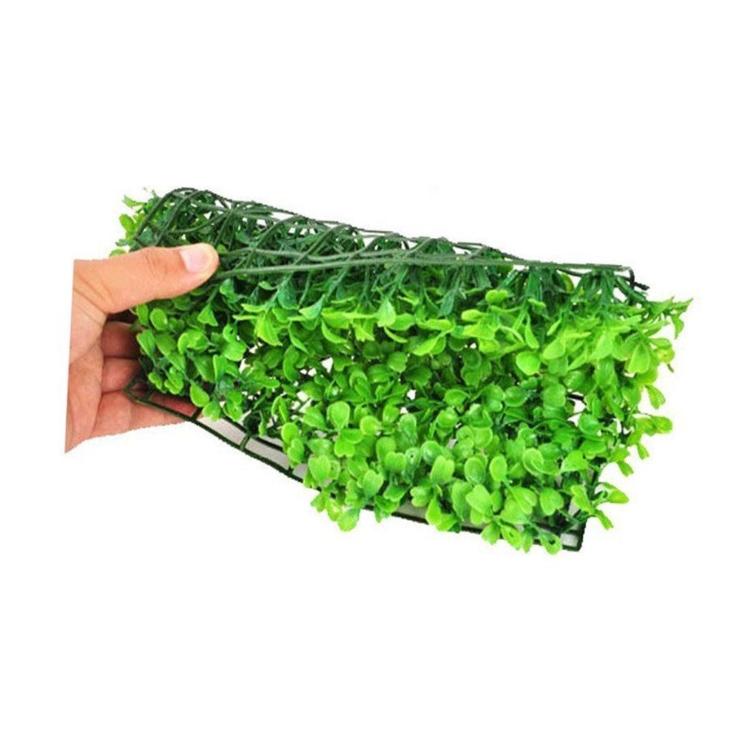 green plastic baby tears mat folded over