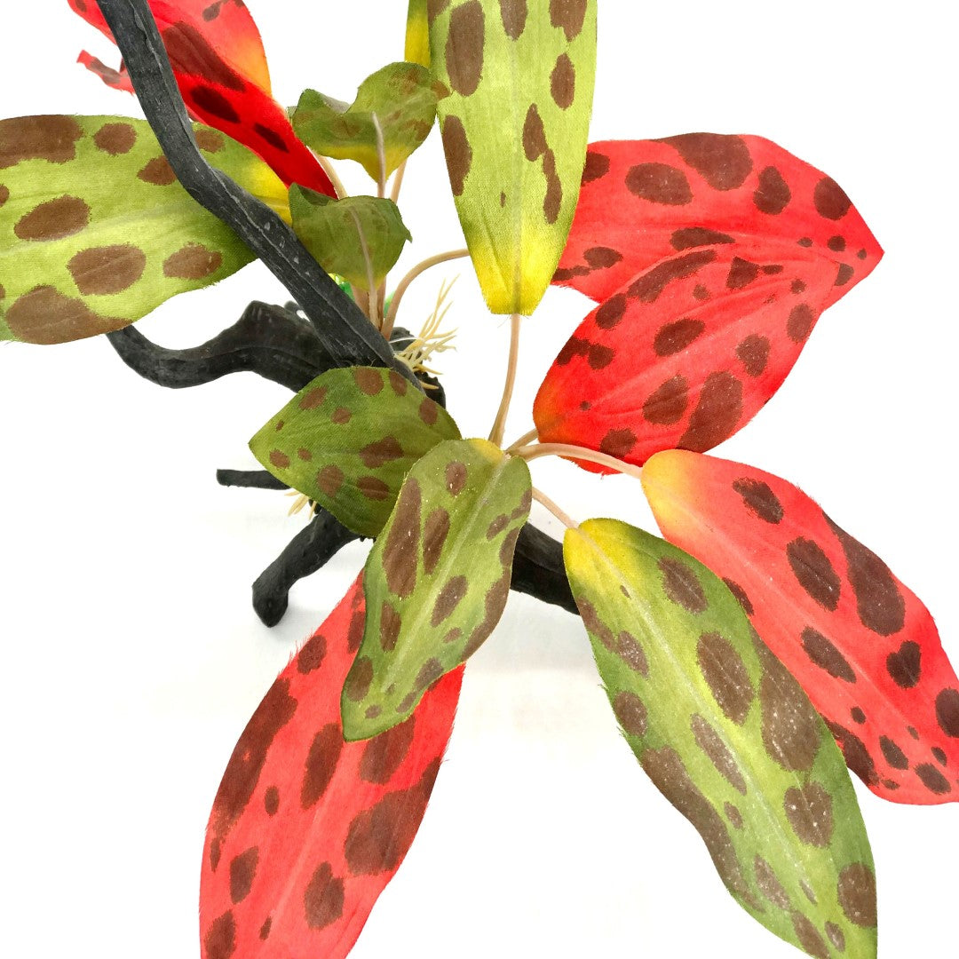 Plastic driftwood with green and red silk leaves