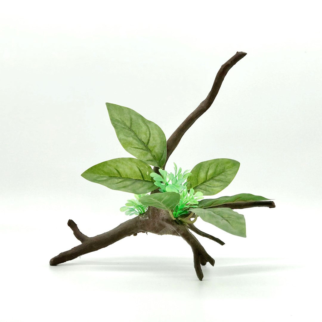 fake driftwood aquarium decoration with green leaves