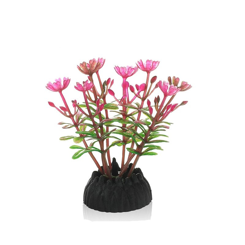plastic aquarium decoration with black base and pink flowers